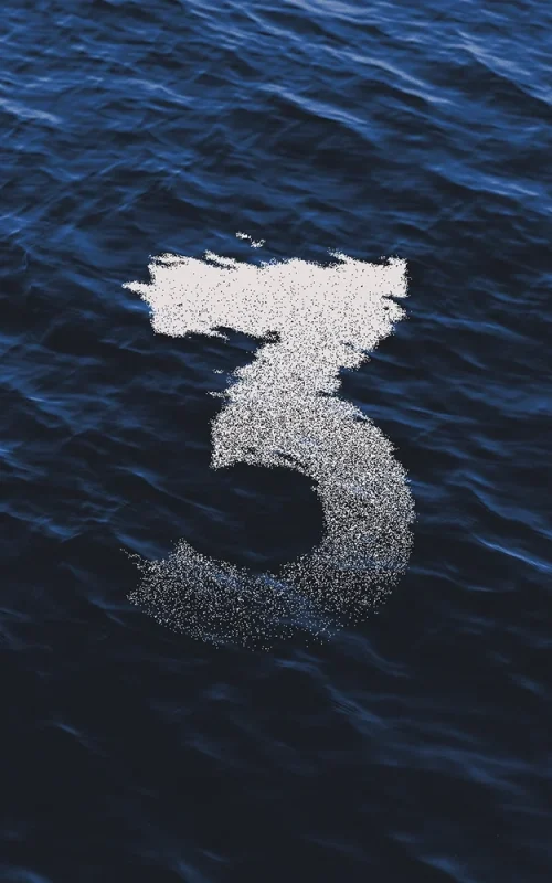 Création graphique du chiffre 3 dans l’eau – Visuel signé Anthony Carrel Chiffre 3 immergé dans la mer, visuel graphique original signé Anthony Carrel